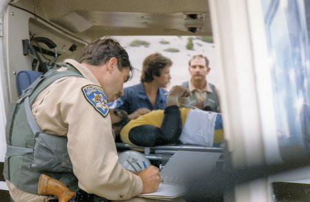 Injured party loaded in CHP helicopter - preparing to depart Injured party loaded in CHP helicopter - preparing to depart