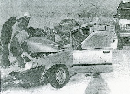 Tragic remains: Rescue workers struggle to extricate the victims of Monday's head on collision on U.S. 395 during white-out conditions Tragic remains: Rescue workers struggle to extricate the victims of Monday's head on collision on U.S. 395 during white-out conditions