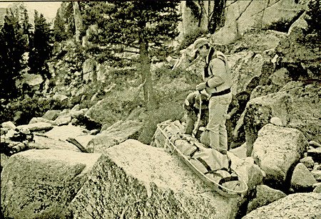 Mono County SAR member Bruce Enyeart prepares to evacuate a deceased subject in the backcountry