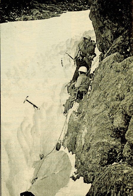 Mono County SAR members Joe Rousek, Doug Nidever, and the late Pete Schoerner prepare to lower the body of a subject that was trapped in a crevasse