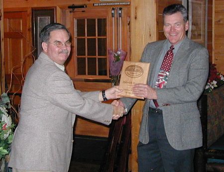 Patrick Byrne receives Candidate of the Year award from Lt. Boe Turner