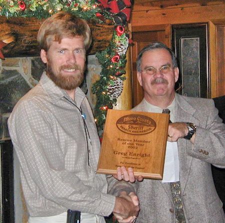 Greg Enright receiving Pete Schoerner Rescue Member of the Year from Lt. Boe Turner