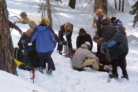 Snowmobile crash victim being treated at scene of the accident Snowmobile crash victim being treated at scene of the accident