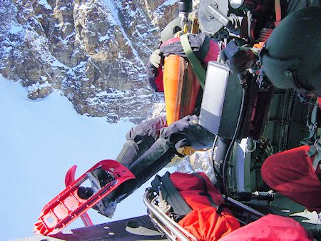 Rescuer about to descend to subject Rescuer about to descend to subject
