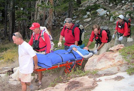 Ops 03-30 - Using wheeled litter to transport injured hiker - Dave Michalski Photo