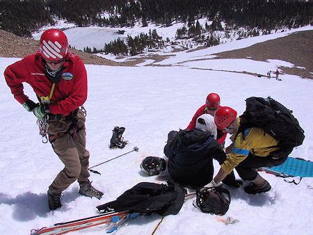 While victim's medical needs are attended to, anchors for the first belay step here and the second belay step below are set up - JW Photo While victim's medical needs are attended to, anchors for the first belay step here and the second belay step below are set up - JW Photo