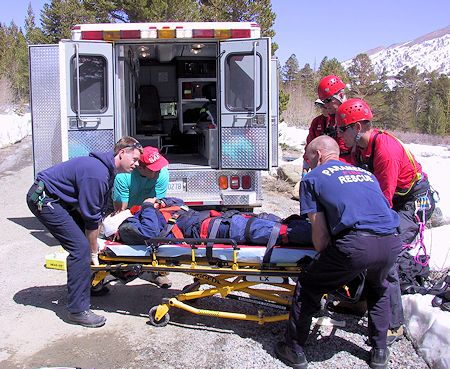 Loading subject into Ambulance Loading subject into Ambulance