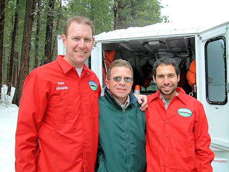 Mike Burdett (center) and team members Mike Burdett (center) and team members