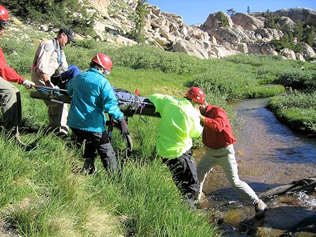 Moving Kauffman across stream to landing zone Moving Kauffman across stream to landing zone