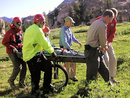 Moving Richard Kauffman to helicopter landing zone