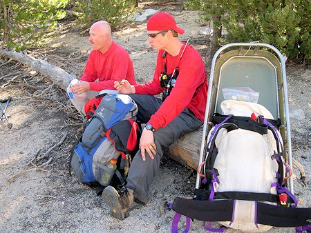 Snack break with litter on the way to trailhead