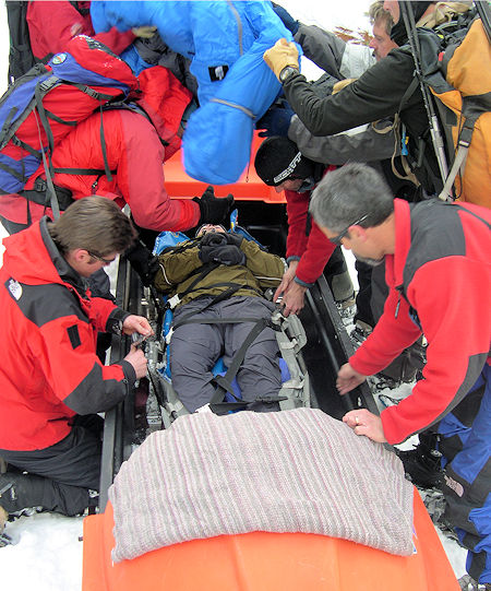 Securing Perrault in sled for transport Securing Perrault in sled for transport