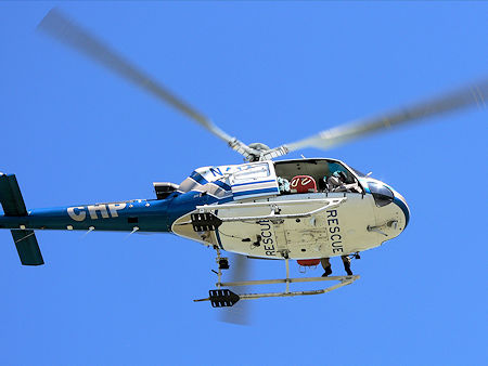 Litter extends out both sides of the helicopter Litter extends out both sides of the helicopter
