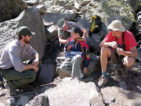 Barry Beck observes as a Ranger asks his son if he would like to be the 'victim' Barry Beck observes as a Ranger asks his son if he would like to be the 'victim'