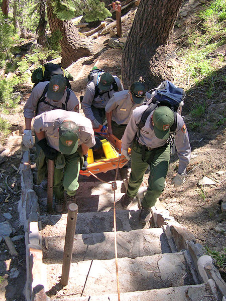 Transporting the 'victim' up from Rainbow Falls