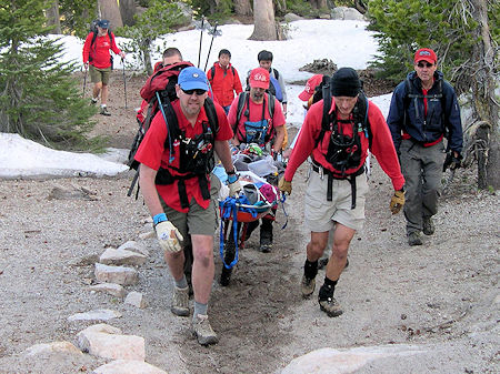 Transporting subject by wheeled litter - Dave Michalski Photo