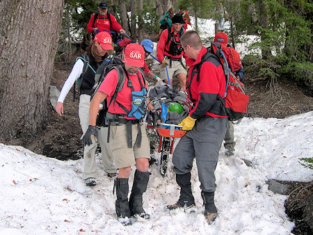 Transporting subject by wheeled litter - Dave Michalski Photo Transporting subject by wheeled litter - Dave Michalski Photo