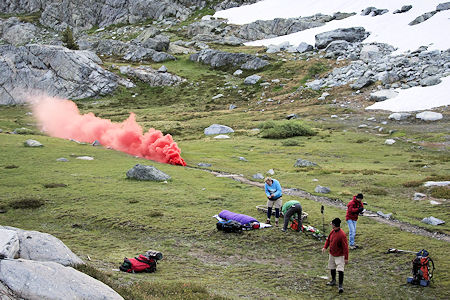 Smoke plume tells incoming helicopter pilot about the wind Smoke plume tells incoming helicopter pilot about the wind