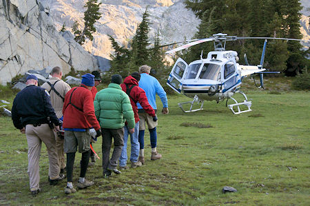 Moving injured party to helicopter Moving injured party to helicopter