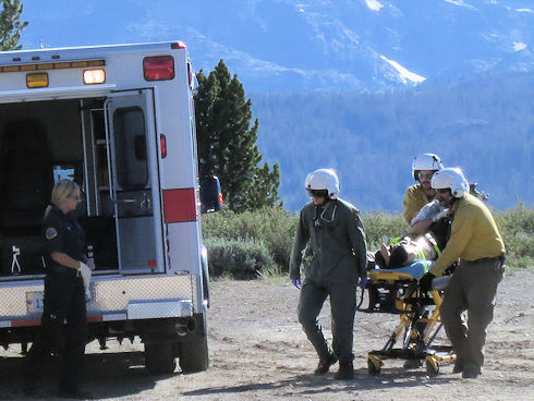Ops 12-384 - Loading victim into ambulance after helicopter extraction Ops 12-384 - Loading victim into ambulance after helicopter extraction