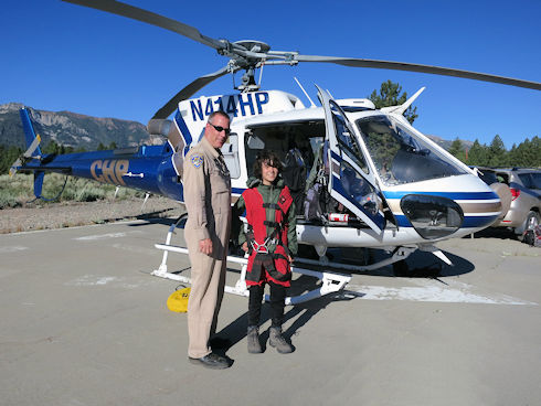 Boy Scout poses with helicopter pilot Boy Scout poses with helicopter pilot
