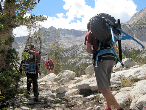 Hiking in with the wheeled litter Hiking in with the wheeled litter