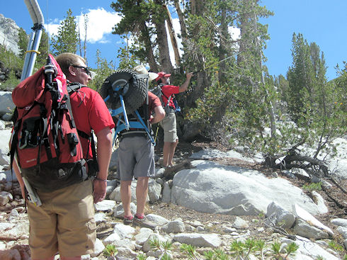 Steve Case points out some landmarks during the hike in