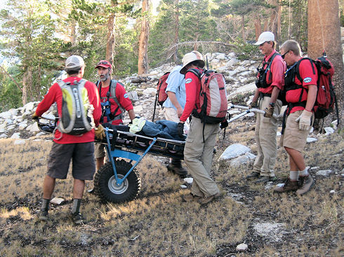 Readying the litter for the injured hiker Readying the litter for the injured hiker
