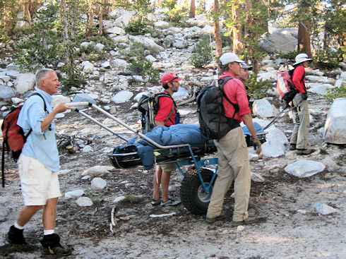 Approaching the injured hiker's campsite