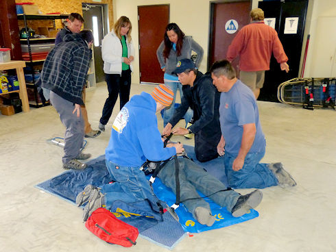 Rick Dodson instructs in basic litter procedures Rick Dodson instructs in basic litter procedures