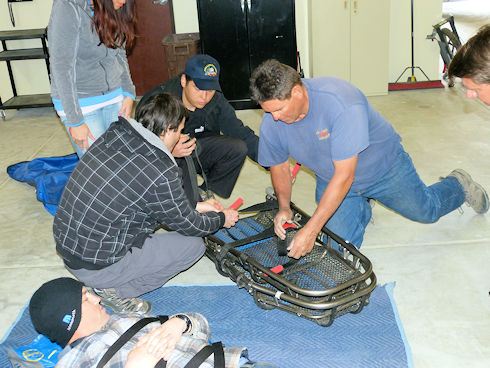 Rick Dodson instructs in basic litter procedures Rick Dodson instructs in basic litter procedures