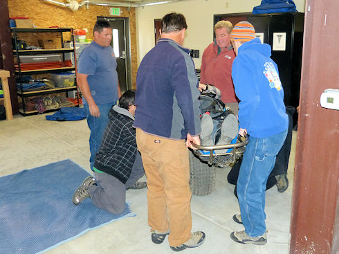 Rick Dodson instructs in basic litter procedures Rick Dodson instructs in basic litter procedures