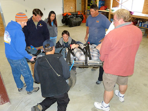 Rick Dodson instructs in basic litter procedures Rick Dodson instructs in basic litter procedures