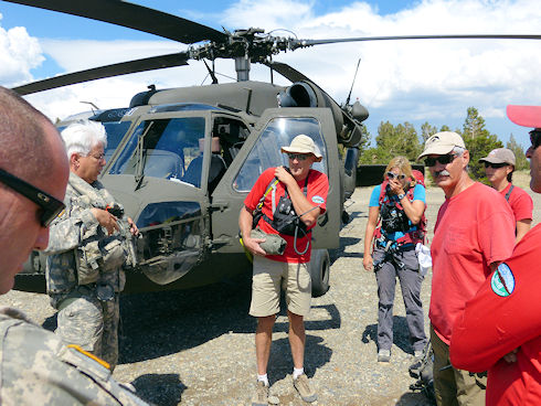 Reviewing plans with helicopter crew Reviewing plans with helicopter crew