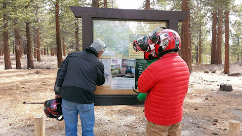 Checking out the area map. The team has had a number of prior missions in the training area at Dead Man Summit