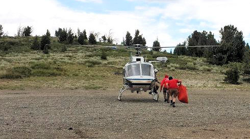 Taking a 'care package' to CHP H40 to take to the stranded party. They spent a cold/wet night on Clyde Minaret Taking a 'care package' to CHP H40 to take to the stranded party. They spent a cold/wet night on Clyde Minaret