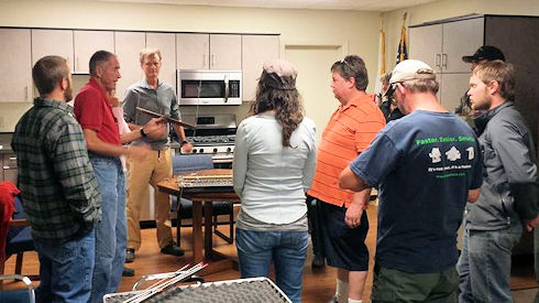 Jim reviewing the gear with team members