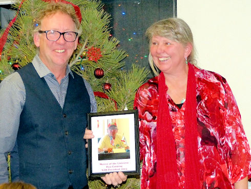 Then she presented Dan with this plaque of ?honor? Then she presented Dan with this plaque of ?honor?