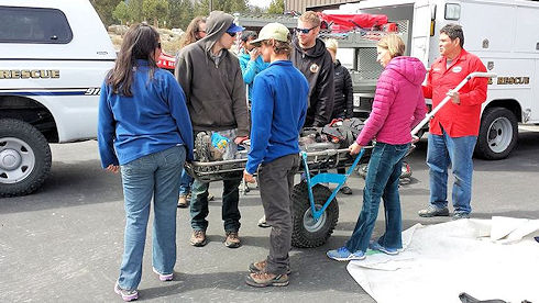 Wheeled litter assembled - ready to move the victim Wheeled litter assembled - ready to move the victim