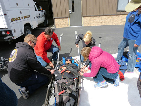 Victim is packaged in the litter - getting ready to add the wheel Victim is packaged in the litter - getting ready to add the wheel