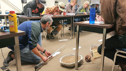 Steve Case instructing use of tracking stick Steve Case instructing use of tracking stick