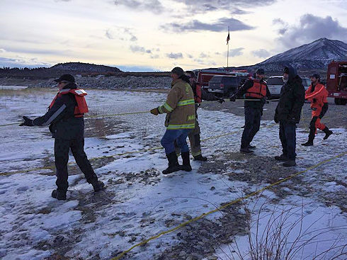 Hauling team on the shore Hauling team on the shore