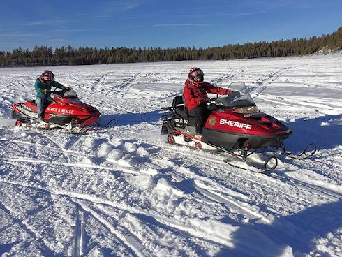 Snowmobile towing Snowmobile towing