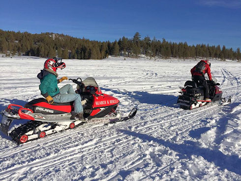Snowmobile towing Snowmobile towing