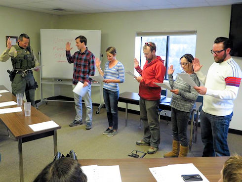 Sgt. Minder swearing in new candidates as Disaster Service Workers                                                                                                                                                                                                                                                                                                                                                                              Sgt. Minder swearing in new candidates ad Disaster service Workers                                                                                                                  