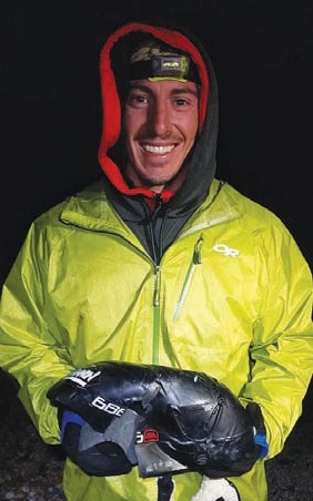 Skier David Arnold holds up what's left of his helmet after a fall down Ellery Bowl - Brank Kral photo Skier David Arnold holds up what's left of his helmet after a fall down Ellery Bowl - Brank Kral photo