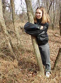 Girl Hugging a tree