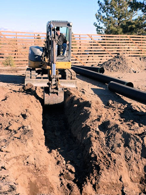 Digging ditch for another drainage pipe - December 5, 2011